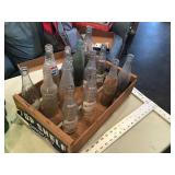 Fruit create with assorted pop bottles some Pepsi