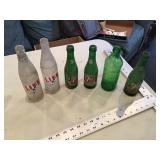 Vintage 7-Up and life pop bottles