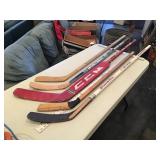 Assorted hockey sticks