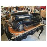 Antique pedal car