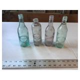 Assorted Iowa pop bottles