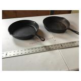 2 cast iron pans