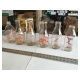 Assorted milk bottles