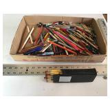 Assorted pens and pencils