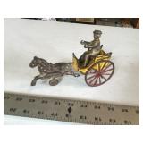 Cast iron buggy with man