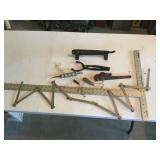 Assorted tools including plumb bobs