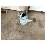 Galvanized water can