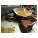 Table with one leaf and four chairs on casters