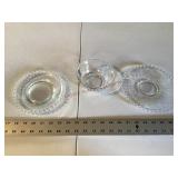 4 Saucers and small bowl