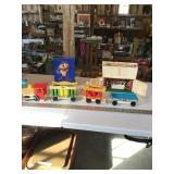 Fisher price train and barn, marble game, etc.