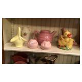 Shelf of planters and vases