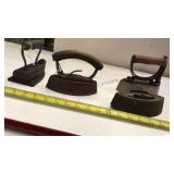 Ruffle iron and 3 sad irons