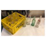 Pepsi and beer bottles