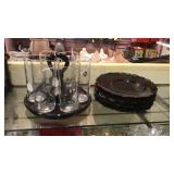 Black glass cattey and glasses and plates