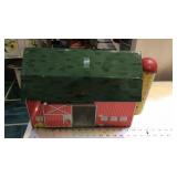 Red metal toy barn