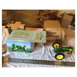 Two cylinder expo John Deere 520 tractor