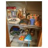 Contents of two shelves in bathroom