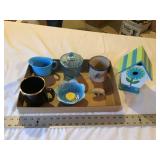 Birdhouse and glassware