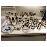 Black and gold coin glasses  and plate set