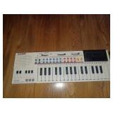 Petit clavier, fonctionnelle, avec sa boite....