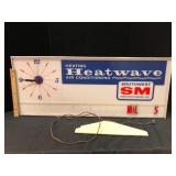 Vintage Heatwave Lighted Advertising Clock