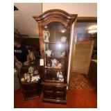 Lighted Curio Cabinet 25"L x 16"W x 78"H Lighted Curio Cabinet 25"L x 16"W x 78"H