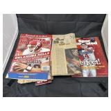 Stack of newspaper clippings & Sports Illustrated