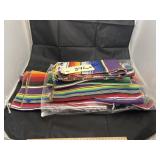 Pile of woven tapestries