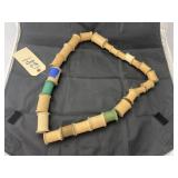 String of Wood Thread Spools