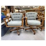 Pair of Mid Century Modern Wood Rolling Chairs