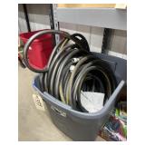 Garden Hose in Plastic Bin