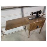 Singer Sewing Machine In Cabinet