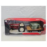 Farmall 1206 NF with Hay Wagon and Bales