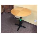 Round wood top table, 26 inches in diameter by 29 Round wood top table, 26 inches in diameter by 29