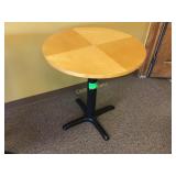 Round wood top table, 26 inches in diameter by 29 Round wood top table, 26 inches in diameter by 29