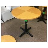 Round wood top table, 26 inches in diameter by 29 Round wood top table, 26 inches in diameter by 29