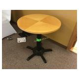Round wood top table, 26 inches in diameter by 29 Round wood top table, 26 inches in diameter by 29