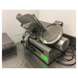 Globe slicer with built-in blade sharpener