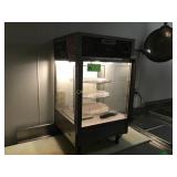 Nemco rotating pizza warmer .  18.5 inches wide x