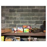 Top shelf of assorted antique boxes and