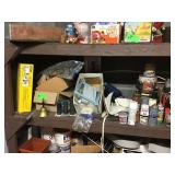 Next shelf down with assorted equipment feet