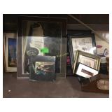 Shelf of assorted pictures and nickname