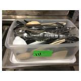 Bin of kitchen utensils