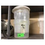Two round ingredient bins with lids