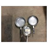 Three frying pans