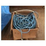 Box of extension cords in loft