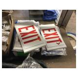 Boxes of assorted exit light covers