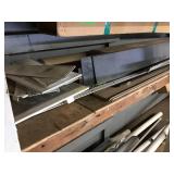 Shelf of assorted cove base metal trim and access