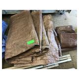 Lot of used brown tarps