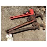 Three assorted pipe wrenches